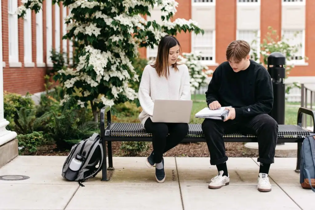 high school students studying on bench outside school Emergent Education Portland based distance education and tutoring
